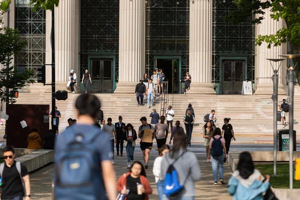 Many students walk across campus near Massachusetts avenue